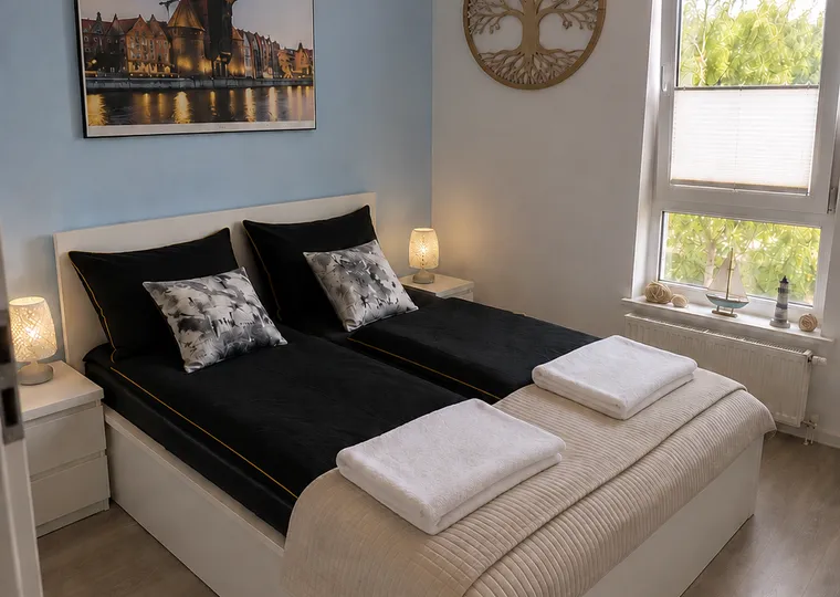 Czysta sypialnia z pościelą, oferta sprzątania apartamentów